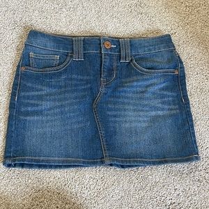 Never worn, mini jean skirt. size 5